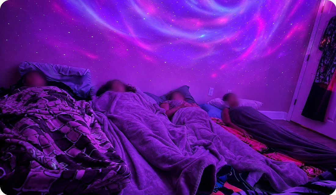 Journeyers resting under a sky of stars